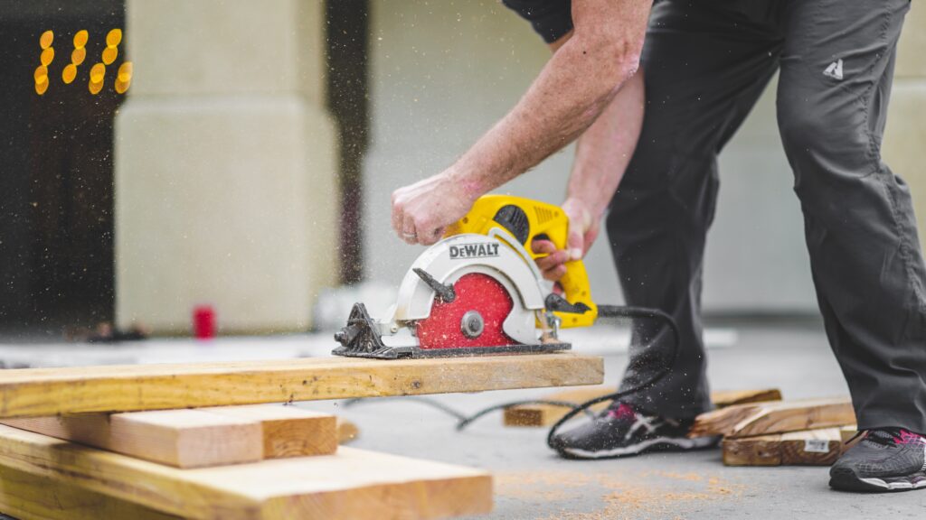 Street Sweeping services in the San Jose, California region - photo-sawing wood with circular saw